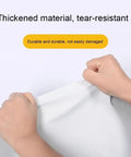 Hands pulling on thickened tear-resistant material showcasing durability of Peel And Stick Contact Paper Self Adhesive Wall Panels For Tv Accent Decor Rock Solid Faux Tile Backsplash Quick Flip Home Makeover No Fuss Setup Smooth Operator Finish Do It Yourself Project.