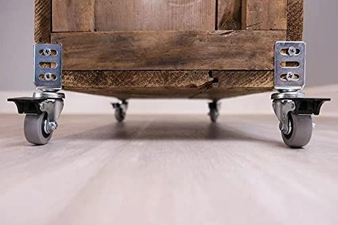 Furniture piece with corner casters on hardwood floor showcasing 1.5 Inch Round Non-Marking Rubber Slip-On Chair Leg Tips.
