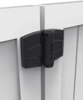 Heavy Duty Self Closing Gate Hinges Pair Black Steel on white vinyl fence, designed for smooth swing and tension adjustment.
