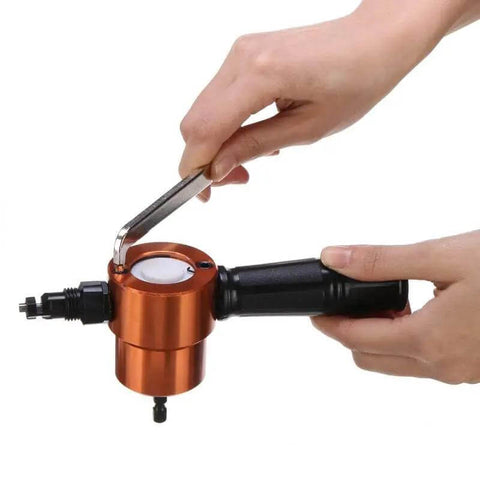 Hands using Power Drill Nibbler Attachment With 360 Degree Adjustable Double Head Metal Sheet Cutter And Wrench, silver orange