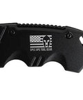 Close-up of beefy grip on spring assisted folding knife with 3.5 inch steel blade, fast deploy one hand open, built for work.