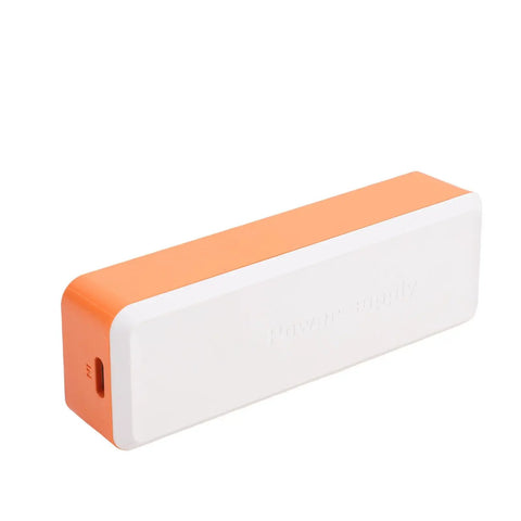 Mini UPS Battery Backup With 2600mAh Rechargeable Lithium Cell white and orange power supply unit side view