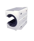Heavy Duty Linear Motion Ball Bearing Slide Block Bushing with smooth black interior for industrial automation and machine shop use.