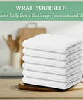 60 Pack 14x17 Inch White Bar Mop Towels Absorbent And Durable Terry Cloth Cleaning Rags stacked on table