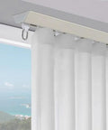 Solid Aluminum Sliding Barn Door Track Kit Featuring Smooth As Butter Quiet Glide And An Adjustable 3.3 To 9.8 Foot Rail For Zero Drama Living Room Space Dividers And Bedroom Privacy Screens In Sharp White with white curtain panels