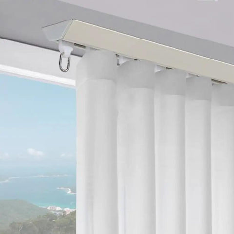 Solid Aluminum Sliding Barn Door Track Kit Featuring Smooth As Butter Quiet Glide And An Adjustable 3.3 To 9.8 Foot Rail For Zero Drama Living Room Space Dividers And Bedroom Privacy Screens In Sharp White with white curtain panels