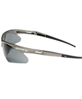 Heavy Duty Safety Glasses With Hard Coated Anti Scratch Polarized Lenses For Crisp Vision And Slip On Fit Ansi Z87 Certified Eye Protection That Handles The Daily Grind Pack Of 12 For Work Sites, shown at angle with smoke lens.