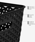 Close-up of No Sweat Home Organization Decorative Storage Basket For Cube Systems And Desk Shelves, Sturdy Plastic Woven Organizer With Total Game Changer And Clean Setup Vibes In Sleek Black Medium showing handles and woven texture.