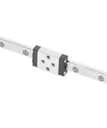 Beefy 75mm By 5mm Linear Guide Rail Carriage in 440C Stainless Steel with oil port shown in precision motion setup