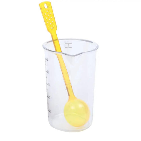 Clear measuring cup with yellow measuring spoon inside for Slick Vintage Balance Syphon Coffee Maker Set Featuring Heavy Duty Stainless Steel And Borosilicate Glass Vacuum Brewing System For A Dope Home Barista Morning Perk Ritual.