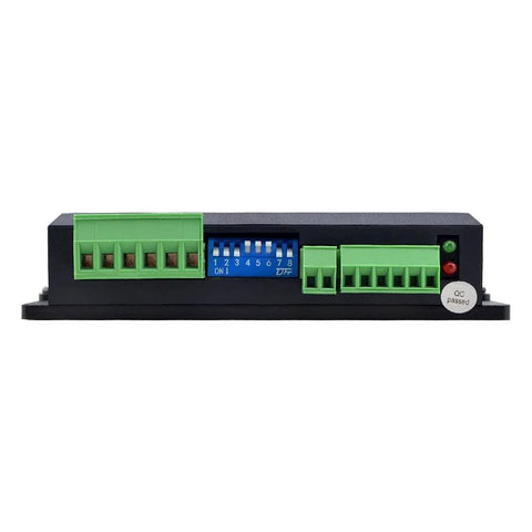 Stepper motor driver module with blue DIP switch bank and two green screw-terminal blocks for NEMA 17/23 motors