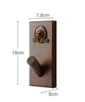 Slick Wall Mounted Coat Rack With Nifty Key Organizer Hook For Bathroom Entryway Closet Top Tier Heavy Duty Multi Hook Stand No Hassle Setup For Versatile Hats Purses And Keys, wooden design with a lion emblem.