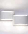 Aluminum Modern LED Wall Sconce Set Of 2 Dope Hardwired Up And Down Wall Mount Lights, shown in cool white glow, 6000K.