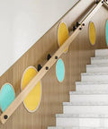 Top Shelf Pine Wood Stair Handrail Featuring Smooth Non Slip Grip And Straight Up Rock Solid Build Designed For Indoor Staircase Safety with colorful wall accents.