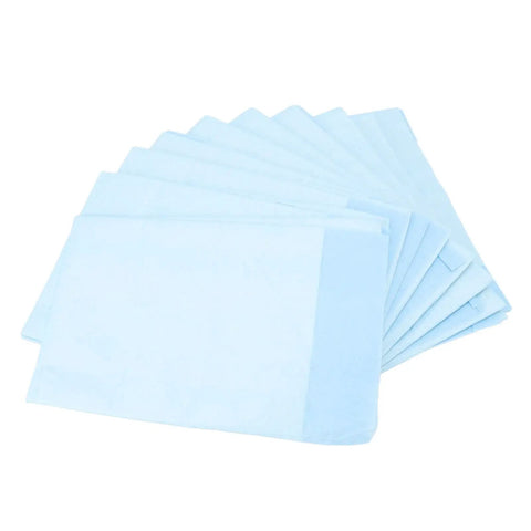Hella Soft Disposable Bed Pads For Adults Heavy Absorbent Underpad With Odor Blocking Fluff Pulp Super Gentle On Skin Top Pick For Maternity Recovery Baby Changing And Sweet Dreams 10 Pack Large stacked blue underpads.