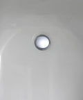 2pcs Brass Rotating Bathtub Drain Plug with Flat Seal for Bathroom installed in a white bathtub looking down at drain hole.