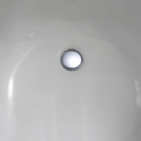 2pcs Brass Rotating Bathtub Drain Plug with Flat Seal for Bathroom installed in a white bathtub looking down at drain hole.