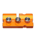 3 In 1 Aluminum Dowel Jig For Woodworking Features Built In Midpoint Alignment For Dead Center Hits showing compact orange jig with alignment holes.
