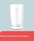 Mixing Cup with Easy-Pour Spout, clear plastic, marked measurements for easy mixing and pouring, home kitchen essential.