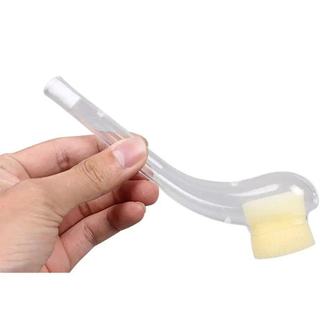 Hand holding a Six Pack Queen Catcher Pipe For Beekeeping, Plastic Queen Cages And Catchers, 15 Cm, with clear color and rounded sponge tip.