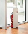 Heavy Duty Steel Fire Extinguisher Box In Sleek Silver Stationary Wall Safe With Baked Enamel Coating located near windows.