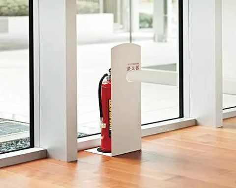 Heavy Duty Steel Fire Extinguisher Box In Sleek Silver Stationary Wall Safe With Baked Enamel Coating located near windows.
