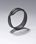 Close-up of a metal ring component for Spring Hose Clamp Pliers For Quick Release And Safe Removal Heavy Duty Auto And Plumbing Tool