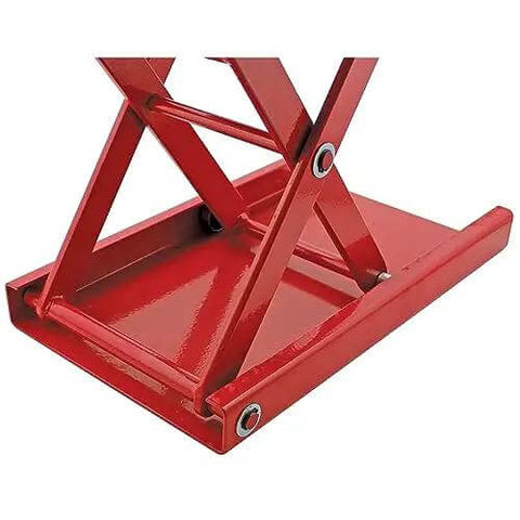 Close-up of red Beefy Wide Motorcycle Scissors Jack With 14 Inch Lift, 1000 Lb Capacity, heavy duty steel frame, and rubber platform pad.