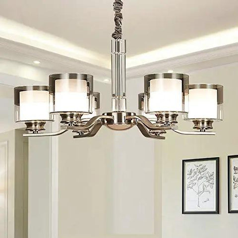 Slick Nickel Four Bulb Led Pendant Chandelier Casts Pure 5500k White Light To Instantly Level Up Your Living Room Dining Setup With Smooth Modern Vibes Today, featuring frosted glass shades.
