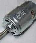 Kickin High Torque R775 Brushed DC Motor With Long Solid Axle And Heavy Duty Ball Bearings, showing detailed motor design.