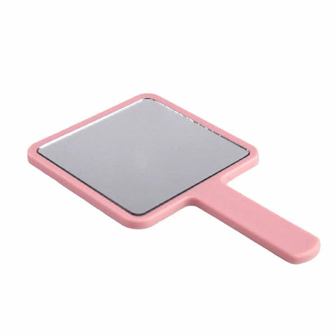 Pink Mini Handheld Lash Mirror For Eyelash Extensions Anti Fog Beauty Mirror, rectangular with handle, ideal for precise lash work.
