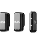 Three black receivers of the Two Mic Wireless Microphone System With Charging Case For Smartphones USB C No Cable Needed