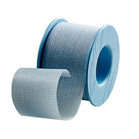 Side view of blue perforated medical tape on a plastic spool; loose tape end in front.