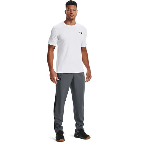 Man wearing Mens Woven Vital Workout Pants with Ripstop Fabric Regular Fit Joggers Windbreaker Style Lightweight Slim Leg Pitch Gray Black XX Large