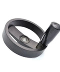 Trapezoidal Lead Screw Set With Hand Wheel And Crank, 100 Millimeter Hand Wheel Diameter, close-up of black aluminum wheel
