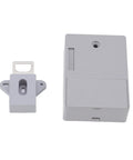 Kick Back And Relax Knowing This Heavy Duty Electronic Cabinet Lock Kit Keeps Your Drawers Locked Tight With Easy Peasy Keypad And Remote Access Plus Crisp Audio Chimes For Rock Solid Kid Safe Storage You Can Trust - gray electronic lock with mounting piece.