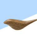 Straight Up Best Bird Shaped Resin Wall Hook With Wood Grain Finish For Coats And Hats Slick Wall Mounted Bedroom Organizer Smooth Edge Design Sweet Home Decor Plus Hassle Free Install in brown wood grain color on blue background.