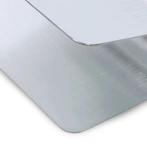 Close-up of sheet metal with smooth edges and brushed finish