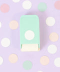 Turquoise multimaterial scalloped circle punch, 2.54 cm diameter, for card making, scrapbooking, DIY crafts, shown on pastel background