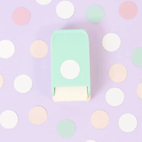 Turquoise multimaterial scalloped circle punch, 2.54 cm diameter, for card making, scrapbooking, DIY crafts, shown on pastel background