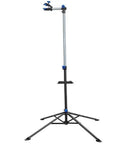 Portable Bike Repair Stand With Adjustable Height Handy Tool Tray And 360 Degree Swivel Clip Holds Up To 66 Lbs Maintenance And Display Stand For Home Garage Or Workshop with tripod base and tool tray.