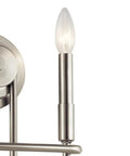 Classic Bronze 2 Light Wall Sconce, 10.75 Inch, side view of sleek metal arm with light bulb for warm ambient lighting.