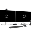 Dual monitors beside a keyboard, mouse, and headphones connected to Smooth As Butter Thunderbolt 5 Docking Station Featuring 12 Versatile Ports And Quad Monitor Support For Lightning Fast Sync Plus Reliable 300W Charging To Get Your Workflow Locked In Tight.