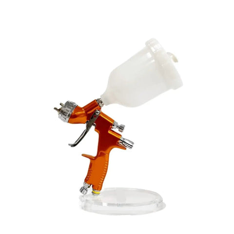 Professional Pneumatic Air Spray Gun With 1.3mm Nozzle For Automotive Paint Spraying And Auto Body Refinishing on a clear stand.