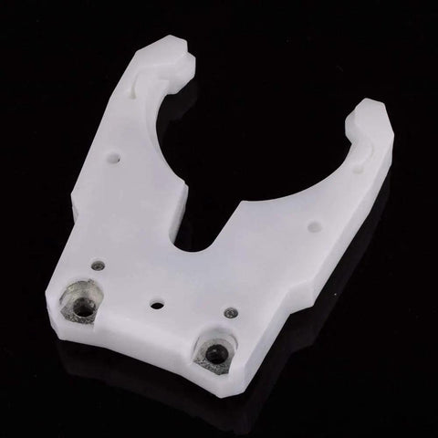 Pro Grade Tool Holder Clamp For CNC Machines And Automatic Tool Change Systems with spindle fork, ABS metal build, top view.