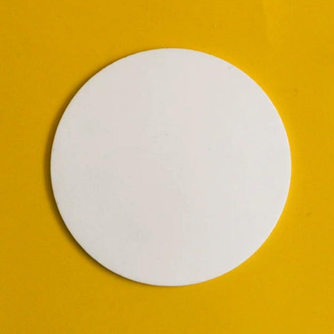 High-Performance Boron Nitride Ceramic Disc for Top-Notch Scientific Research - Killer Thermal Conductivity and Electrical Insulation Up to 2000 Degrees Celsius - Perfect for High-Temp Experiments and Lab Applications - 1 Premium Piece, 20mm Diameter by showing a white round disc on a yellow background
