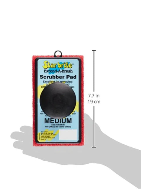 All-Purpose Scrubber Pad With Ergonomic Handle In Red, Available In Fine, Medium, And Coarse Textures for cleaning surfaces.