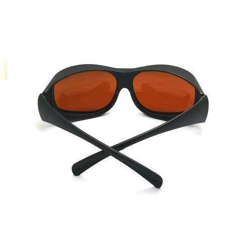Professional Grade Infrared Laser Safety Glasses Shielding Your Peepers From 532Nm 808Nm And 1064Nm Beams With Built Tough Clear Lens And Killer Optical Density, showing a pair with orange lenses.
