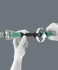 Hands using Zyklop 8000 C SB Ratchet Five In One Design with Fine Tooth Gear, showing swivel action and push button release feature.