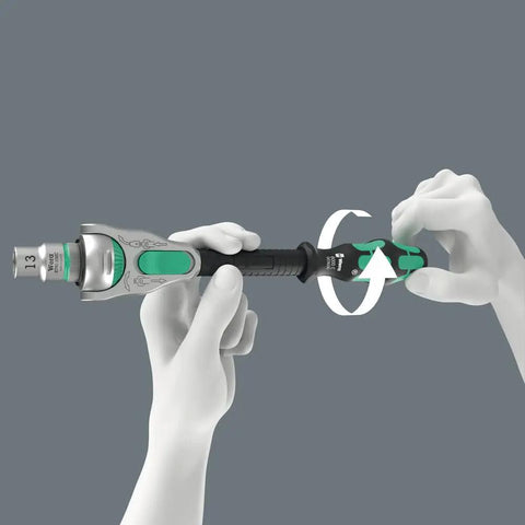 Hands using Zyklop 8000 C SB Ratchet Five In One Design with Fine Tooth Gear, showing swivel action and push button release feature.